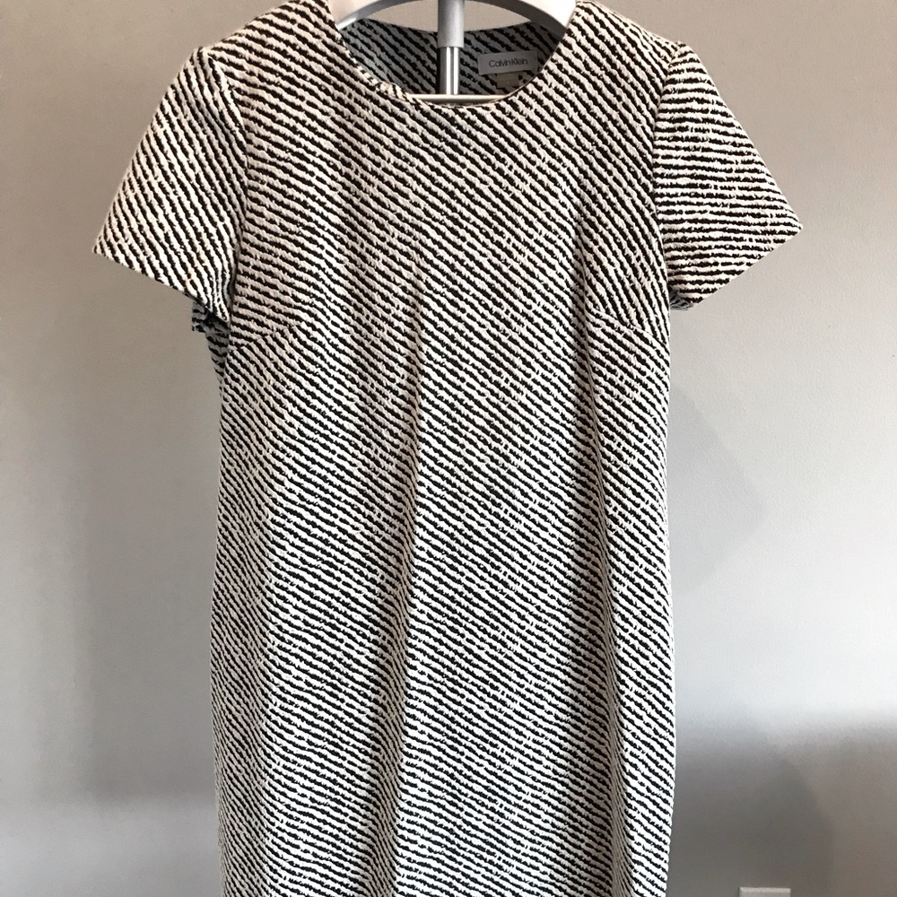 Black & white striped Calvin Klein dress with zipper back in size (12).